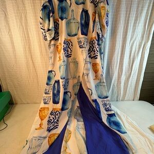 Sassy Jones Zena layered cape jumpsuit. Blue vase print